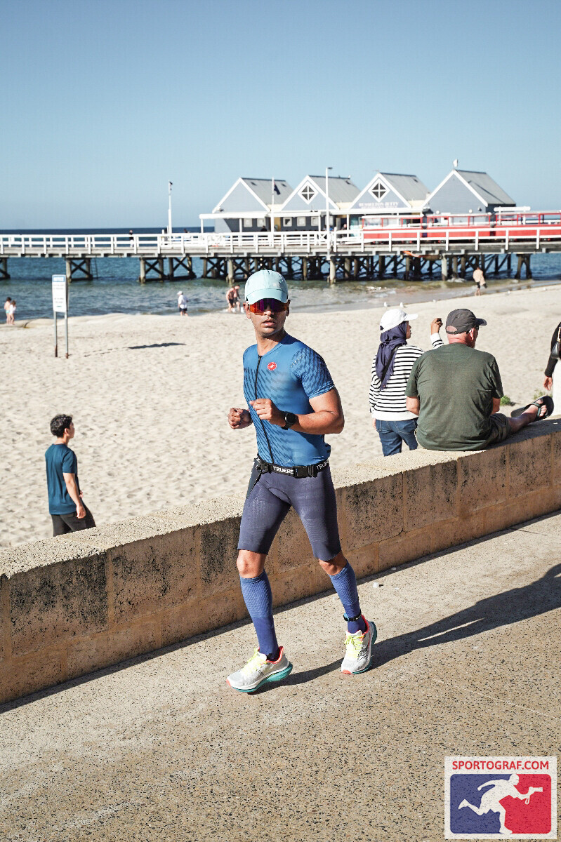 Vivek running the Ironman WA marathon along the Busselton foreshore
